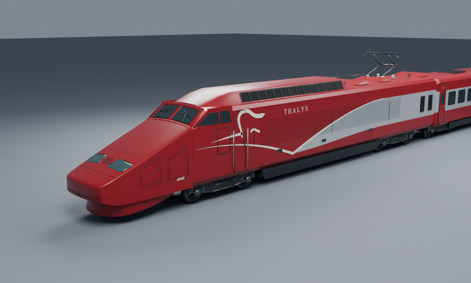 An orange TGV Sud-Est on the railway tracks